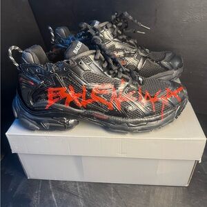 Balenciaga Black Sneakers with Red Detailing